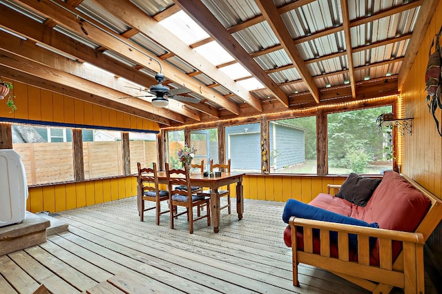 1516 Madison Ave, Austin, TX 78757 - sunroom featuring a deck, wood walls, and hardwood / wood-style flooring