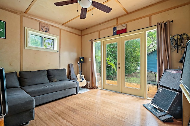 1516 Madison Ave, Austin, TX 78757 - living room with wood finished floors, a ceiling fan, and french doors
