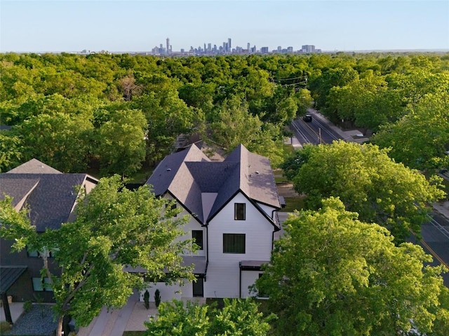 drone / aerial view with a forest view