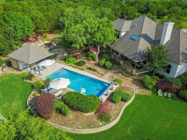 bird's eye view featuring a view of trees