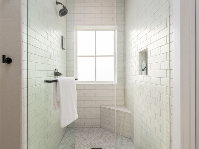 11000 5th St, Leander, TX 78645 - bathroom featuring tiled shower