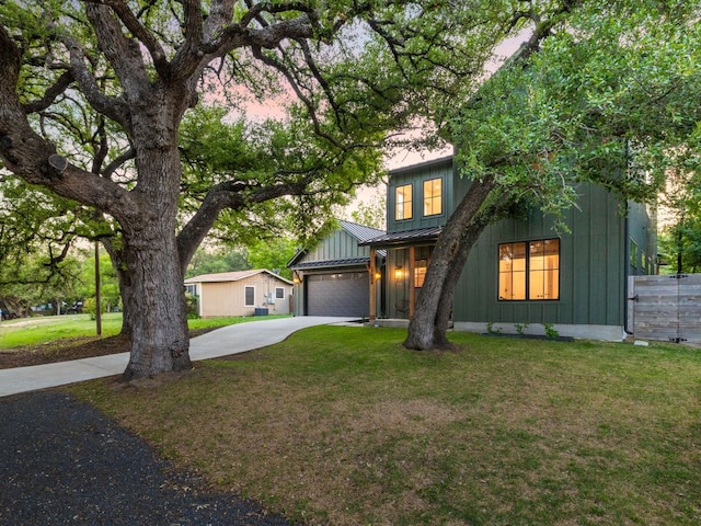 11000 5th St, Leander, TX 78645 - view of front of property featuring board and batten siding, driveway, a standing seam roof, and metal roof