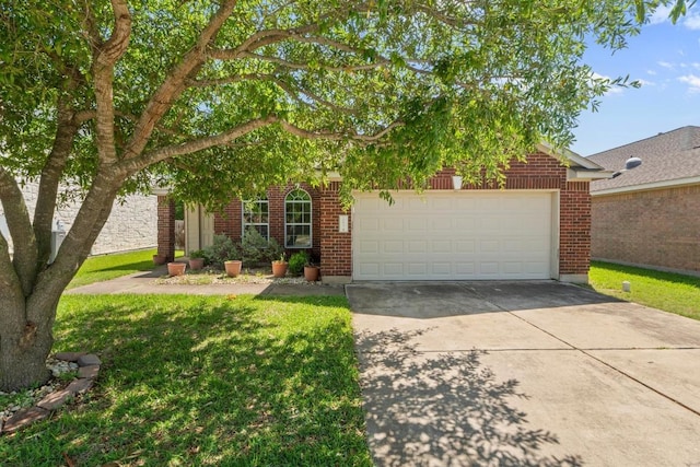 obstructed view of property featuring an attached garage, a front lawn, brick siding, and concrete driveway
