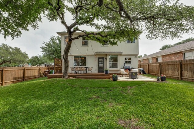1161 Stone Forest Trl, Round Rock, TX 78681 - back of house with a wooden deck and a patio area