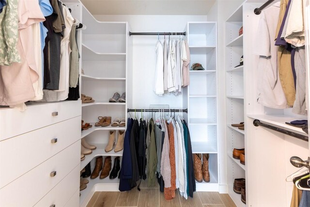 1161 Stone Forest Trl, Round Rock, TX 78681 - walk in closet featuring wood finished floors