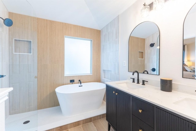 1161 Stone Forest Trl, Round Rock, TX 78681 - full bathroom featuring a tile shower, a soaking tub, and double vanity