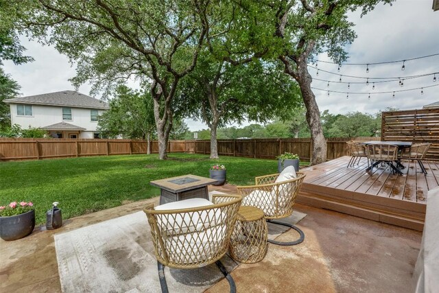 1161 Stone Forest Trl, Round Rock, TX 78681 - view of patio with outdoor dining area, a fire pit, and a wooden deck