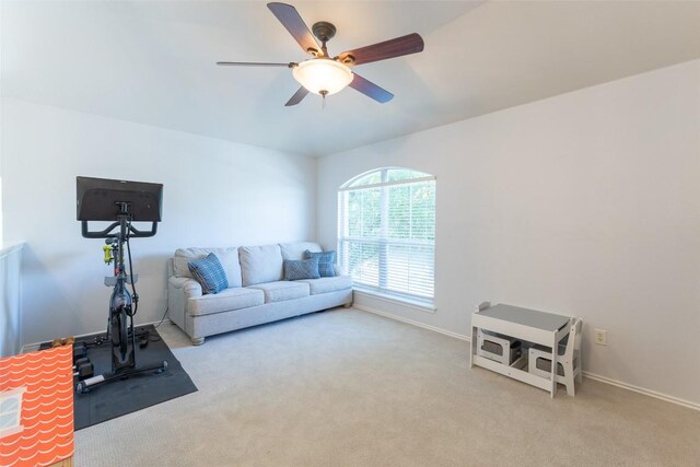 1161 Stone Forest Trl, Round Rock, TX 78681 - living area with carpet, a ceiling fan, and baseboards