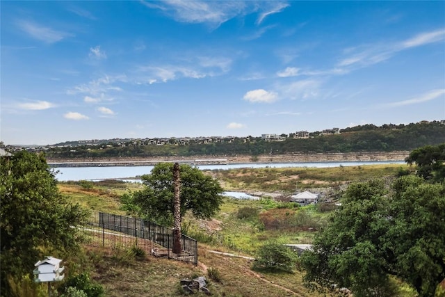 water view featuring fence