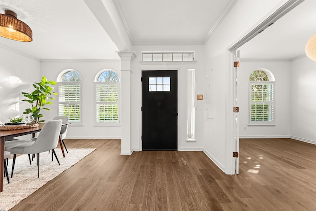 13300 Country Lake Dr, Austin, TX 78732 - foyer featuring baseboards, ornamental molding, plenty of natural light, and wood finished floors
