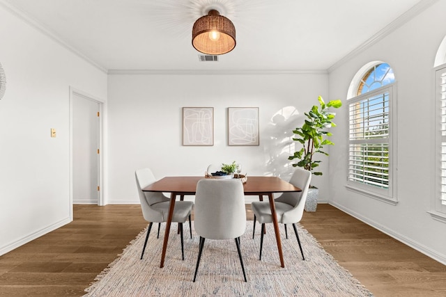 13300 Country Lake Dr, Austin, TX 78732 - dining space featuring crown molding and wood finished floors