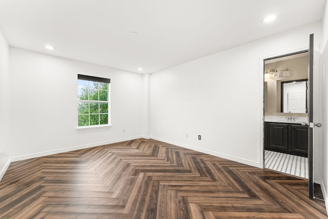 13300 Country Lake Dr, Austin, TX 78732 - unfurnished room with baseboards, a sink, and recessed lighting