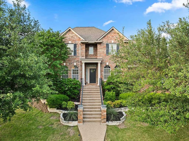 13300 Country Lake Dr, Austin, TX 78732 - view of front facade featuring brick siding