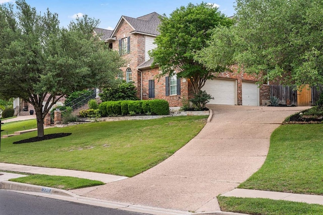 13300 Country Lake Dr, Austin, TX 78732 - view of front of house featuring brick siding, a front lawn, and driveway