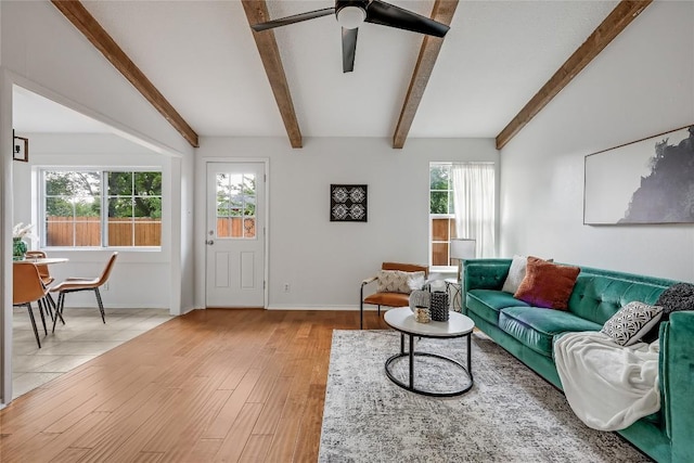 8221 Renton Dr, Austin, TX 78757 - living room featuring baseboards, beamed ceiling, ceiling fan, and light wood-style floors