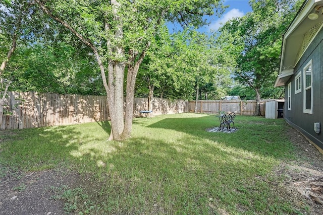 8221 Renton Dr, Austin, TX 78757 - view of yard featuring a fenced backyard