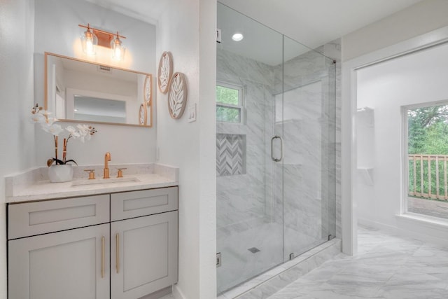 5307 Downs Dr, Austin, TX 78721 - full bath featuring vanity, marble finish floors, and a marble finish shower