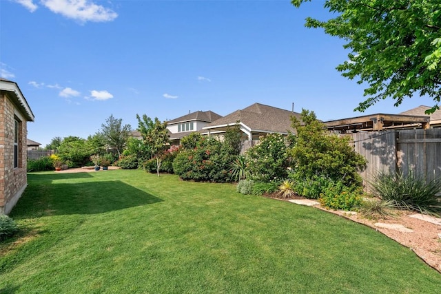 view of yard featuring a fenced backyard