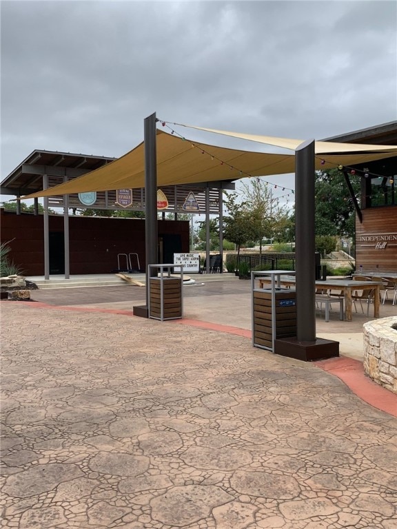 view of property's community featuring a patio and a gazebo