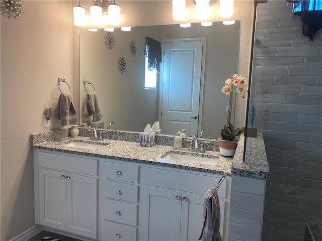 full bath featuring a sink and double vanity
