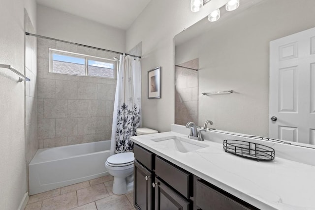 bathroom featuring vanity, shower / tub combo with curtain, and toilet