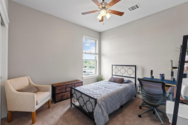 bedroom featuring visible vents, carpet, and ceiling fan