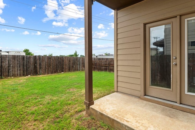 view of yard with a fenced backyard and a patio area