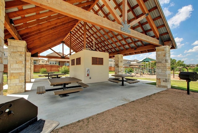 view of property's community with a patio and a gazebo