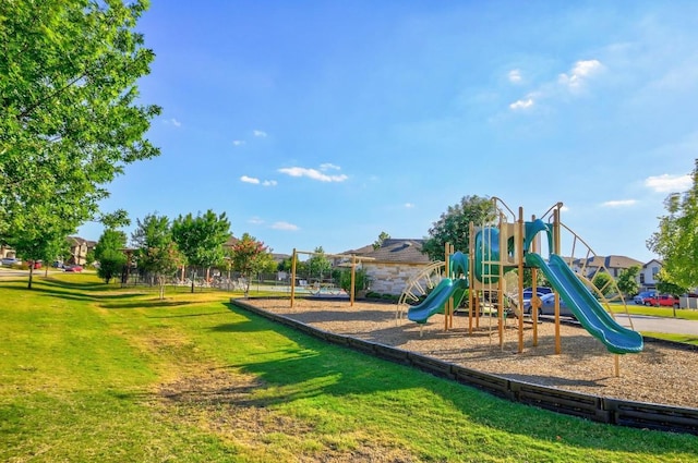 community play area featuring a yard