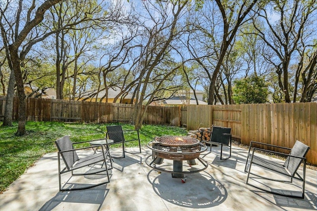 240 Fort Mabry Loop, Georgetown, TX 78628 - view of patio / terrace with a fenced backyard and a fire pit