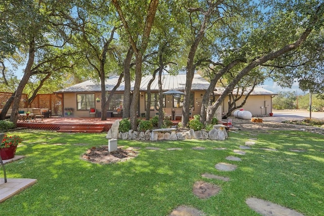 2858 Cedar Hollow Rd, Georgetown, TX 78628 - back of property featuring a deck and a yard