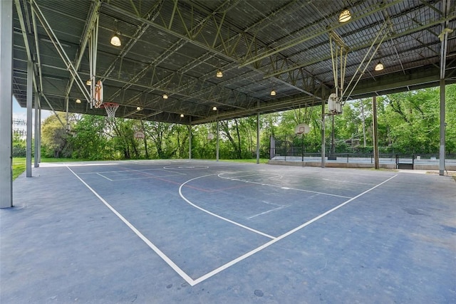 view of sport court featuring community basketball court and fence