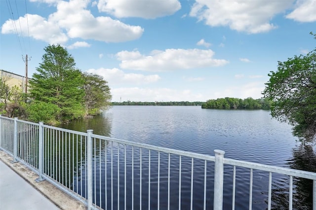 view of water feature featuring fence