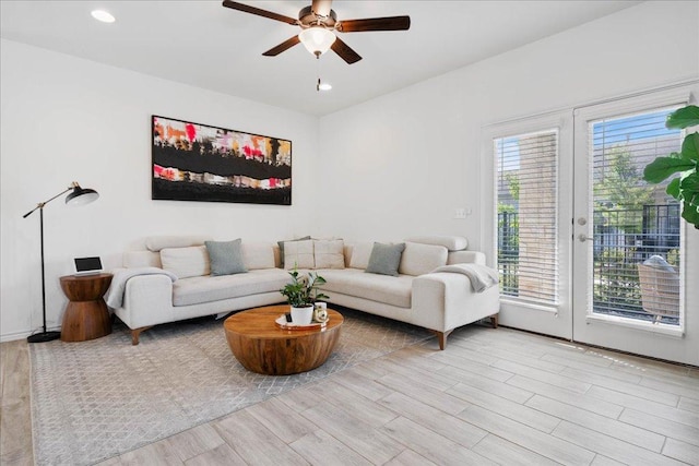 9015 Looksee Ln, Austin, TX 78744 - living area featuring ceiling fan, wood finished floors, recessed lighting, and french doors