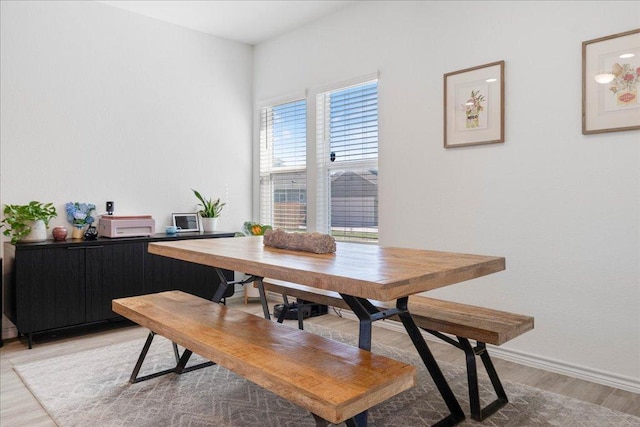 9015 Looksee Ln, Austin, TX 78744 - dining area with baseboards and light wood-style floors