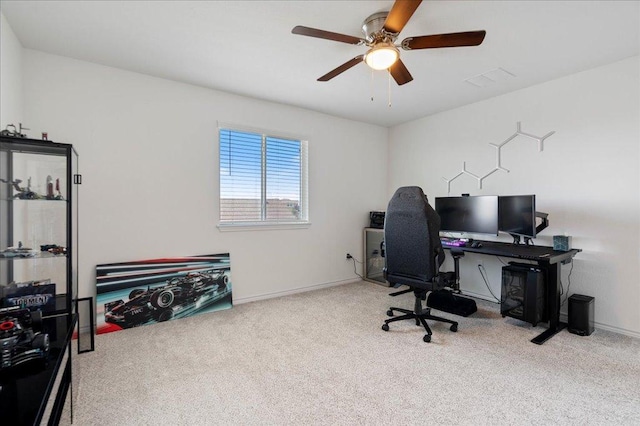 9015 Looksee Ln, Austin, TX 78744 - office area with baseboards, a ceiling fan, and carpet