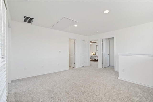 9015 Looksee Ln, Austin, TX 78744 - unfurnished bedroom with attic access, light carpet, recessed lighting, and baseboards