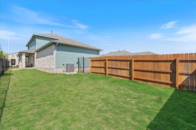 9015 Looksee Ln, Austin, TX 78744 - view of yard featuring a fenced backyard and cooling unit