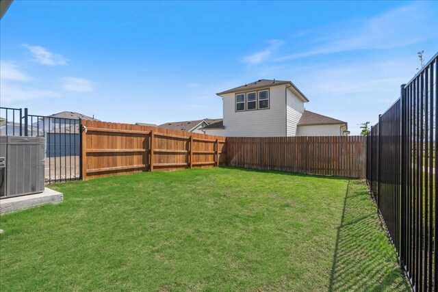 9015 Looksee Ln, Austin, TX 78744 - view of yard featuring cooling unit