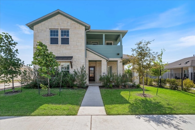 9015 Looksee Ln, Austin, TX 78744 - view of front facade featuring fence, a front yard, and stone siding