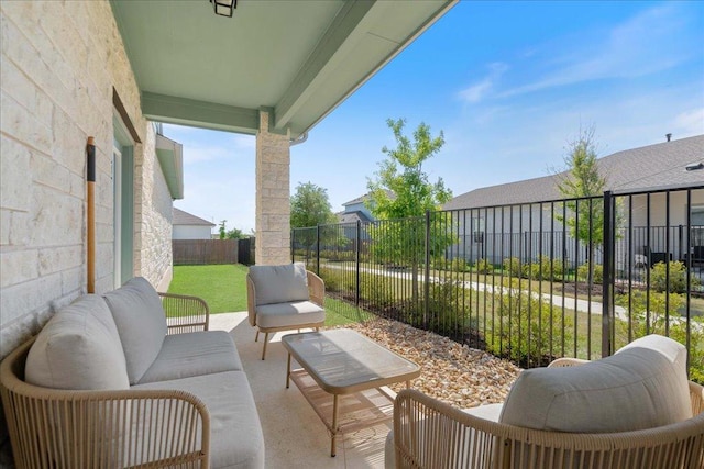 9015 Looksee Ln, Austin, TX 78744 - view of patio / terrace with fence and an outdoor living space