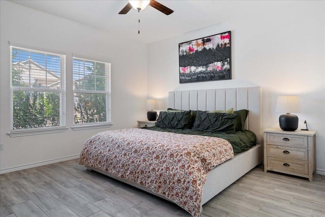 9015 Looksee Ln, Austin, TX 78744 - bedroom featuring light wood finished floors, baseboards, and ceiling fan