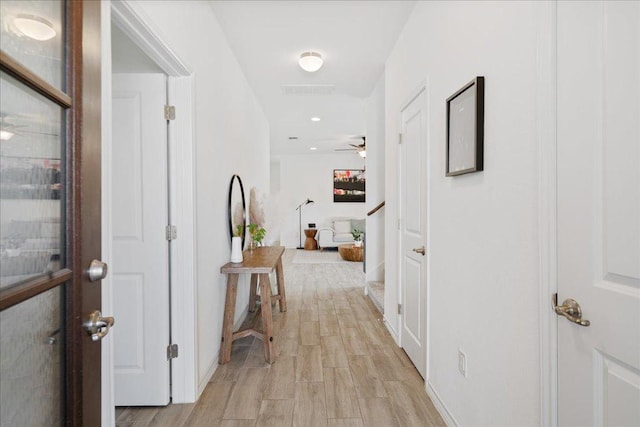 9015 Looksee Ln, Austin, TX 78744 - corridor with light wood-style floors, recessed lighting, and baseboards