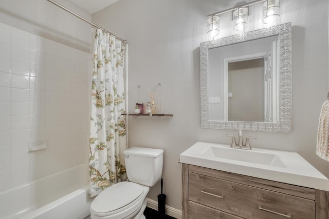 full bathroom featuring vanity, toilet, and shower / tub combo