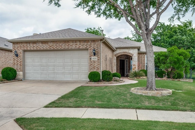 ranch-style house with a garage, a front lawn, roof with shingles, brick siding, and driveway
