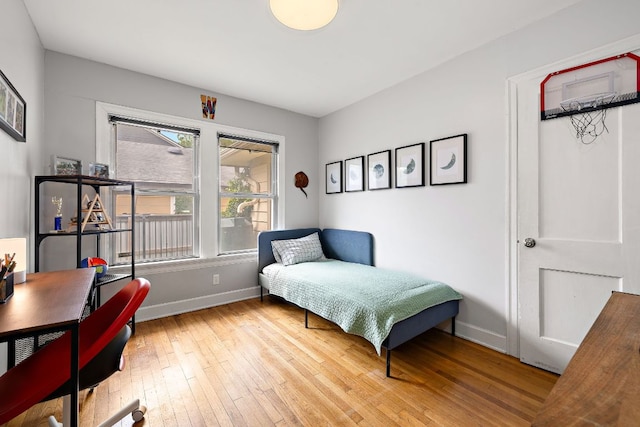 5011 Eilers Ave, Austin, TX 78751 - bedroom featuring baseboards and light wood-style flooring