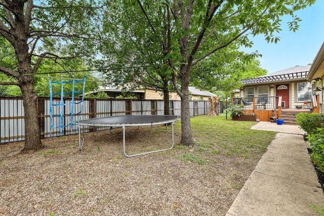 5011 Eilers Ave, Austin, TX 78751 - fenced backyard with a trampoline