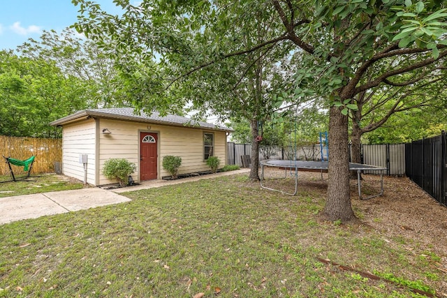 5011 Eilers Ave, Austin, TX 78751 - view of yard with a trampoline and an outbuilding