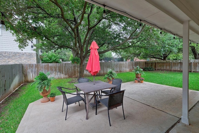view of patio / terrace with a fenced backyard and outdoor dining space