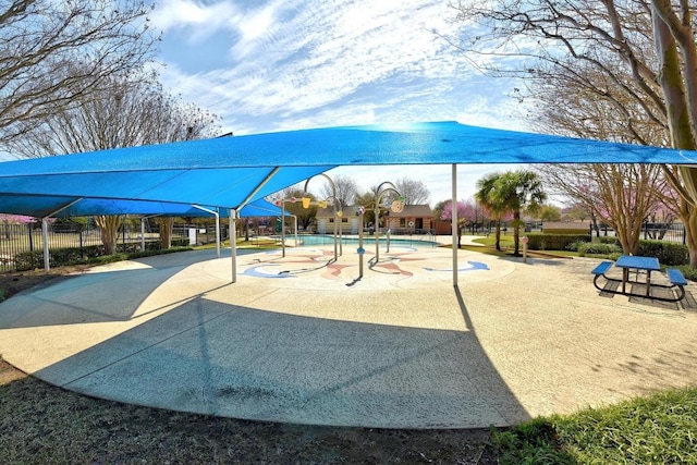view of playground with fence